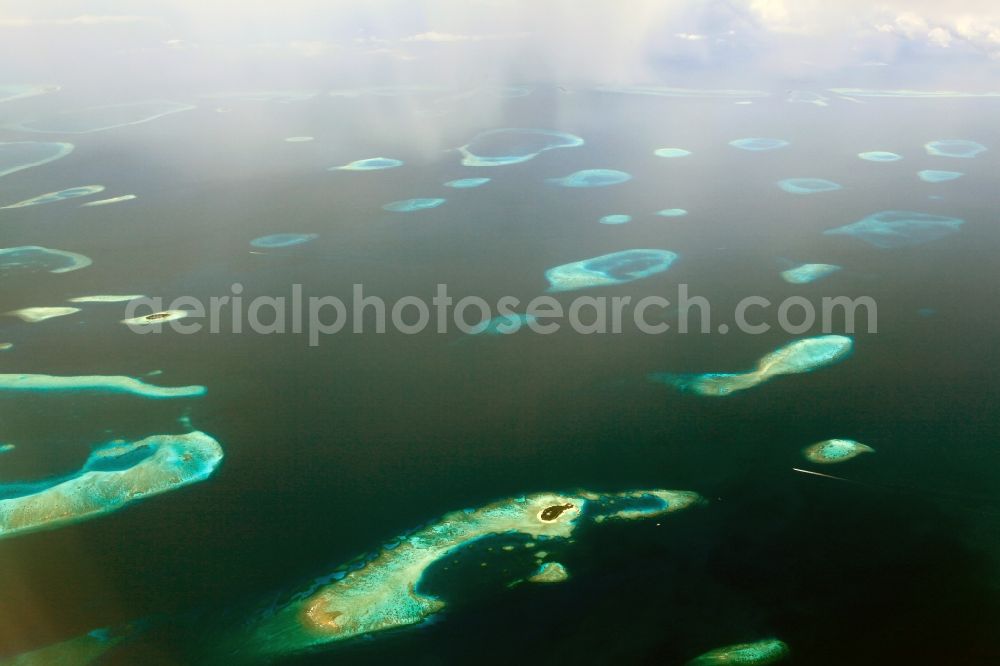 Dharanboodhoo from the bird's eye view: Coastal Indian Ocean - island in Dhahran Boodhoo in Central Province, Maldives