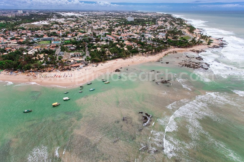 Aerial image Salvador - Coastal areas with beach on the Bay de Baja Itapajipe in the Ribeira district of Salvador, in the province of Bahia in Brazil