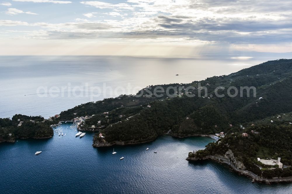 Portofino from above - Coastal landscape with a view to the harbor bay in the Mediterranean Sea of the city Portofino in Liguria in Italy