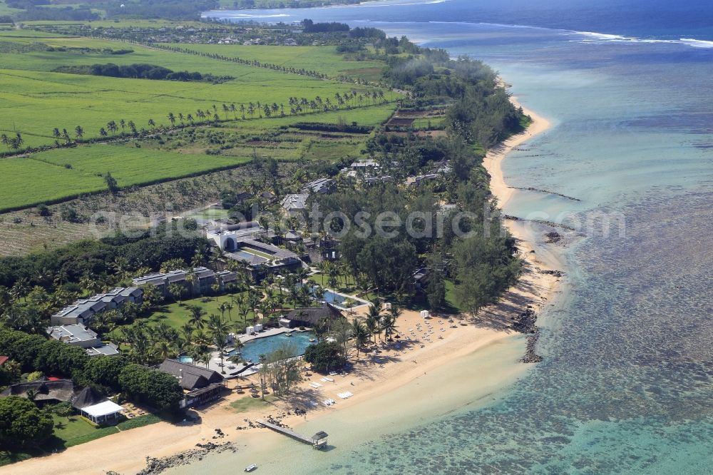 Bel Ombre from the bird's eye view: Beach, lagoon, hotels and golf resort on the south coast of the island Mauritius in the Indian Ocean