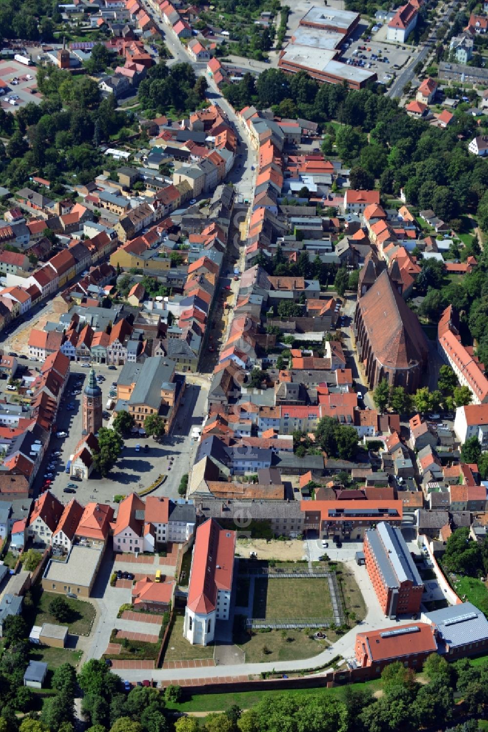 Luckau from above - Culture Church and former prison in the center of Luckau in Brandenburg