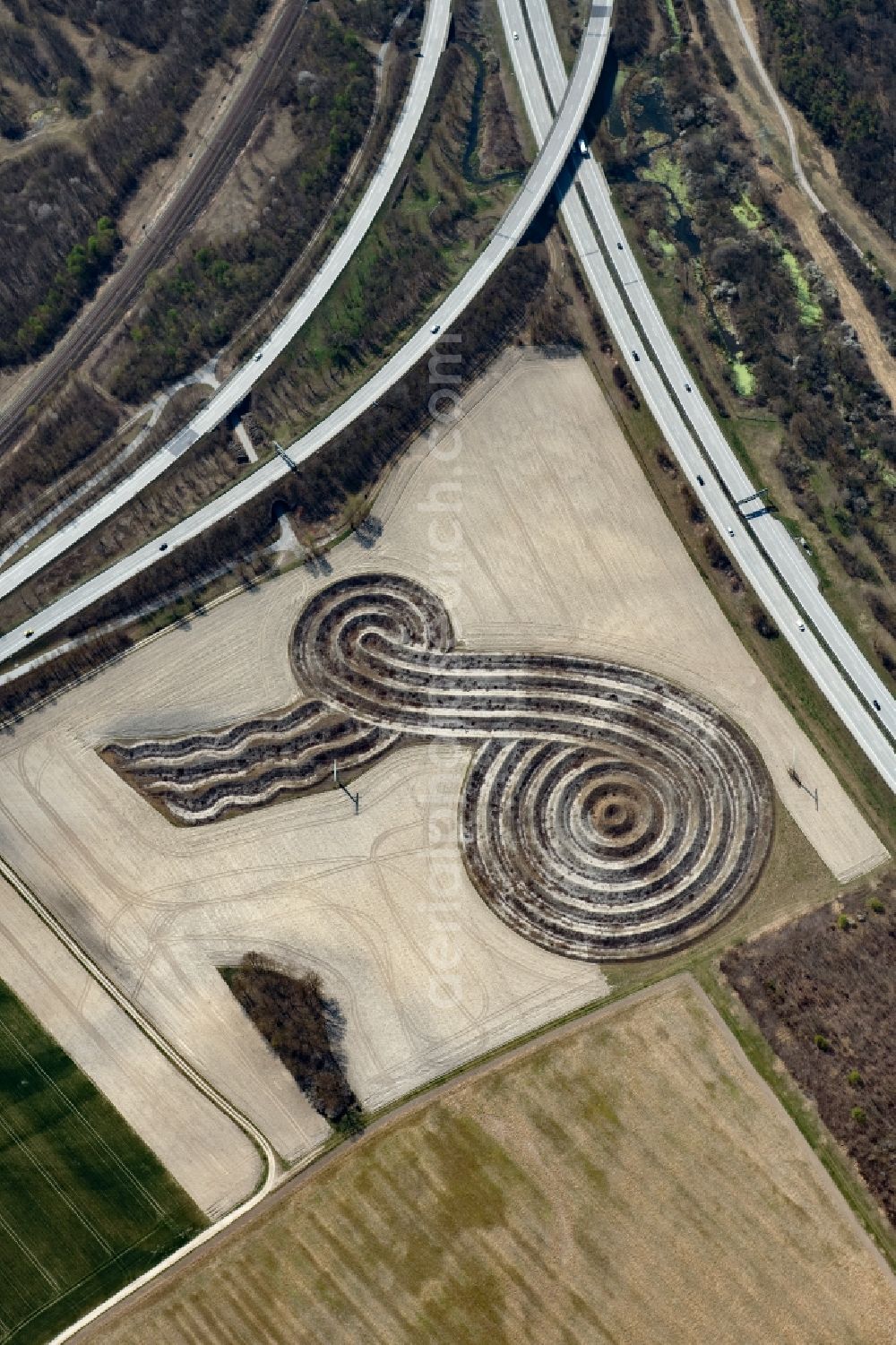 Freising from above - Outdoor art- installation of earth sign Eine Insel for the Zeit by the artist Wilhelm Holderied at the Munich airport in Freising in the state Bavaria, Germany