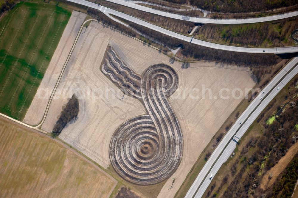 Freising from the bird's eye view: Outdoor art- installation of earth sign Eine Insel for the Zeit by the artist Wilhelm Holderied at the Munich airport in Freising in the state Bavaria, Germany