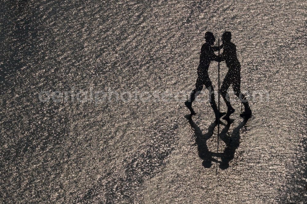 Aerial photograph Berlin - Outdoor art- installation Molecule Man on the water surface on the flux flow of the Spree An den Treptowers in Berlin in Germany