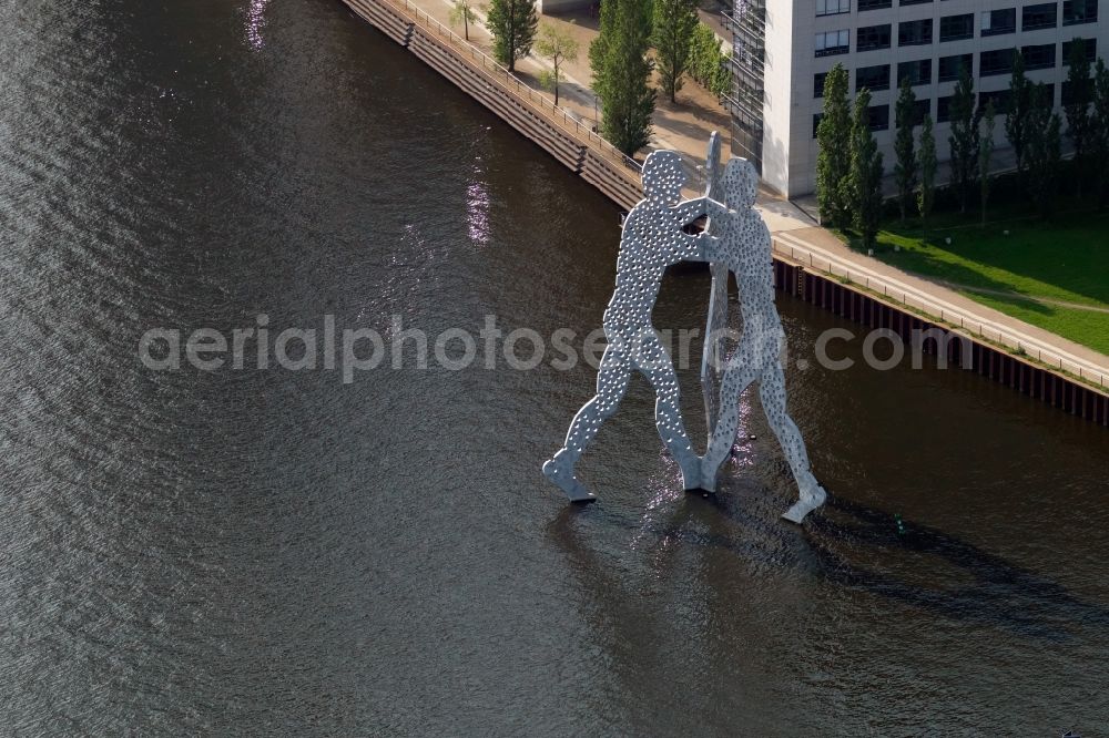 Berlin from above - Outdoor art- installation Molecule Man on the water surface on the flux flow of the Spree An den Treptowers in Berlin in Germany