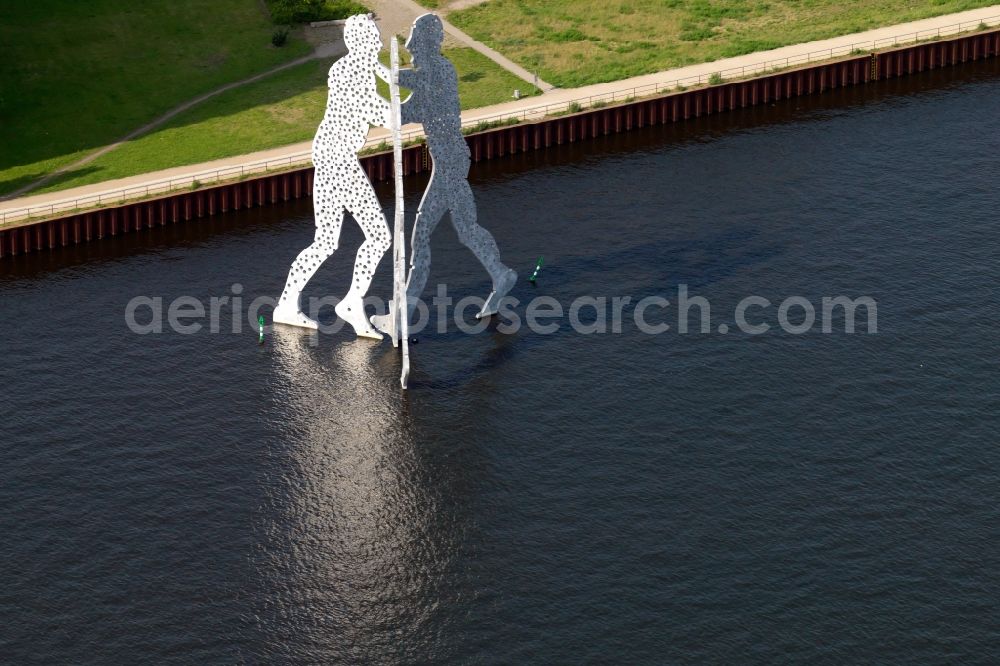 Aerial image Berlin - Outdoor art- installation Molecule Man on the water surface on the flux flow of the Spree An den Treptowers in Berlin in Germany