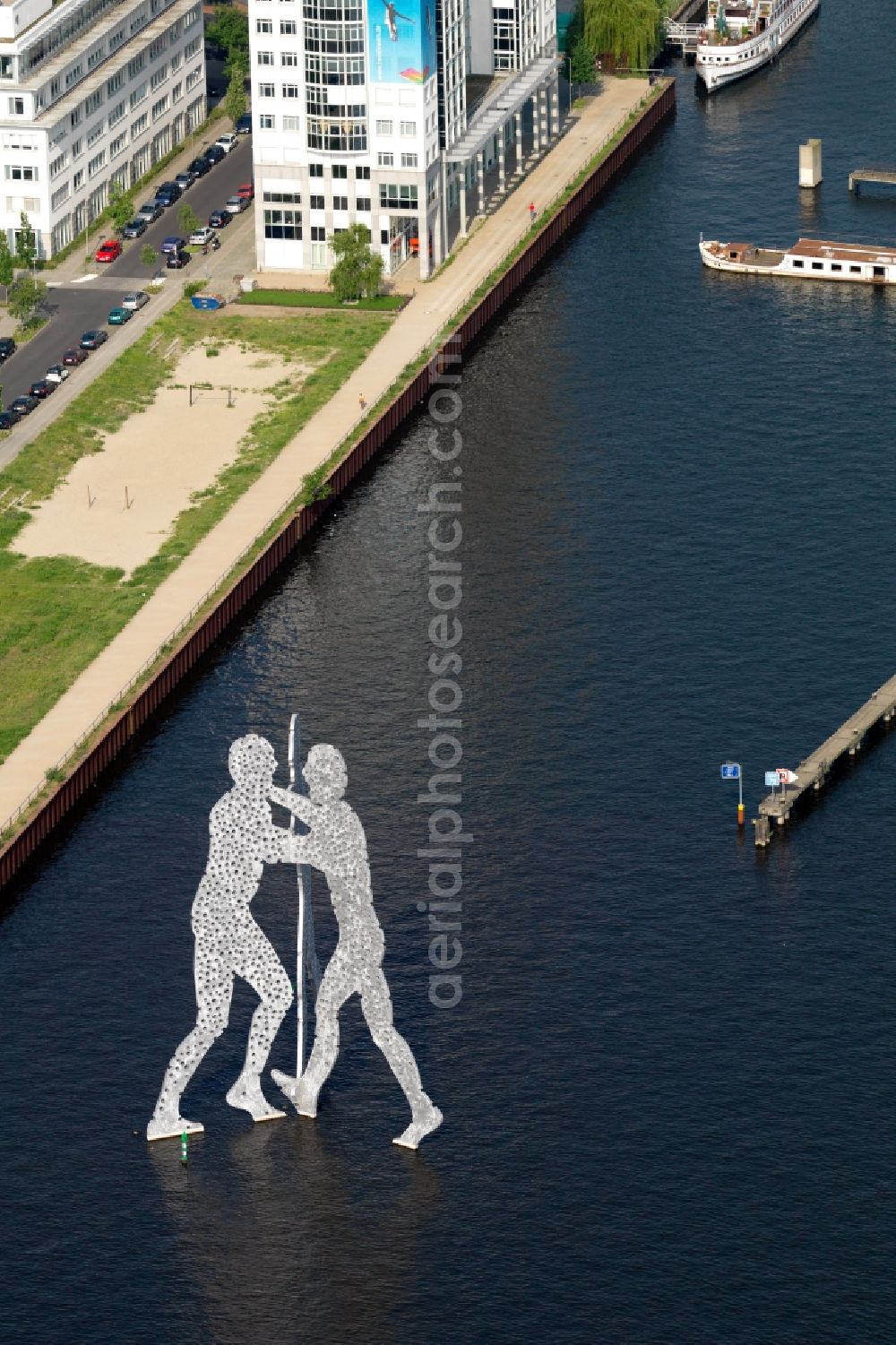 Berlin from above - Outdoor art- installation Molecule Man on the water surface on the flux flow of the Spree An den Treptowers in Berlin in Germany