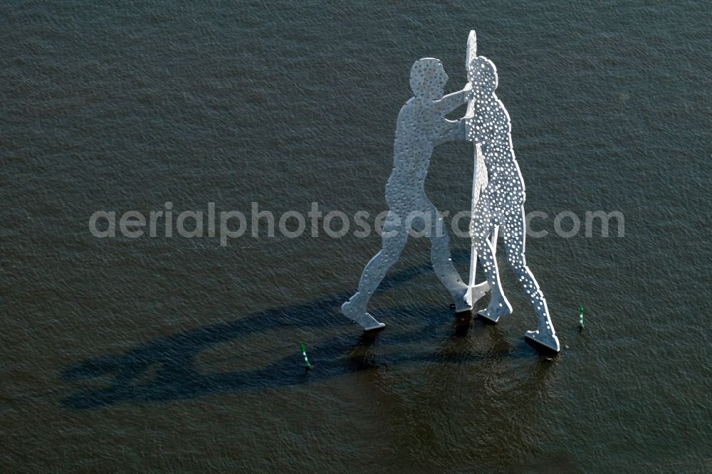 Berlin from the bird's eye view: Outdoor art- installation Molecule Man on the water surface on the flux flow of the Spree An den Treptowers in Berlin in Germany