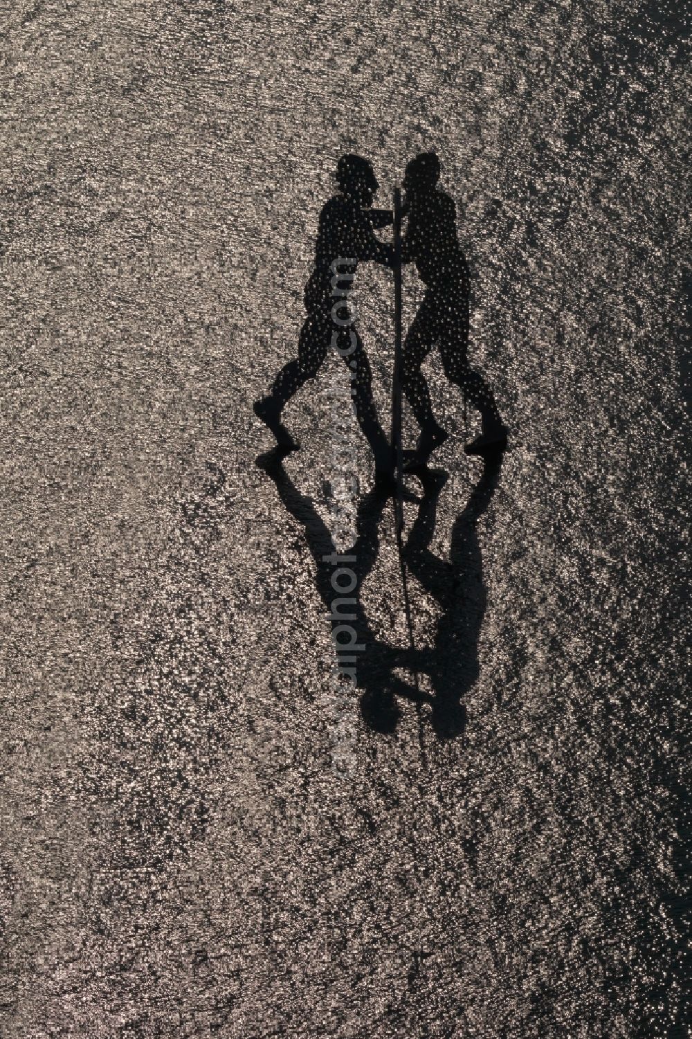 Aerial image Berlin - Outdoor art- installation Molecule Man on the water surface on the flux flow of the Spree An den Treptowers in Berlin in Germany