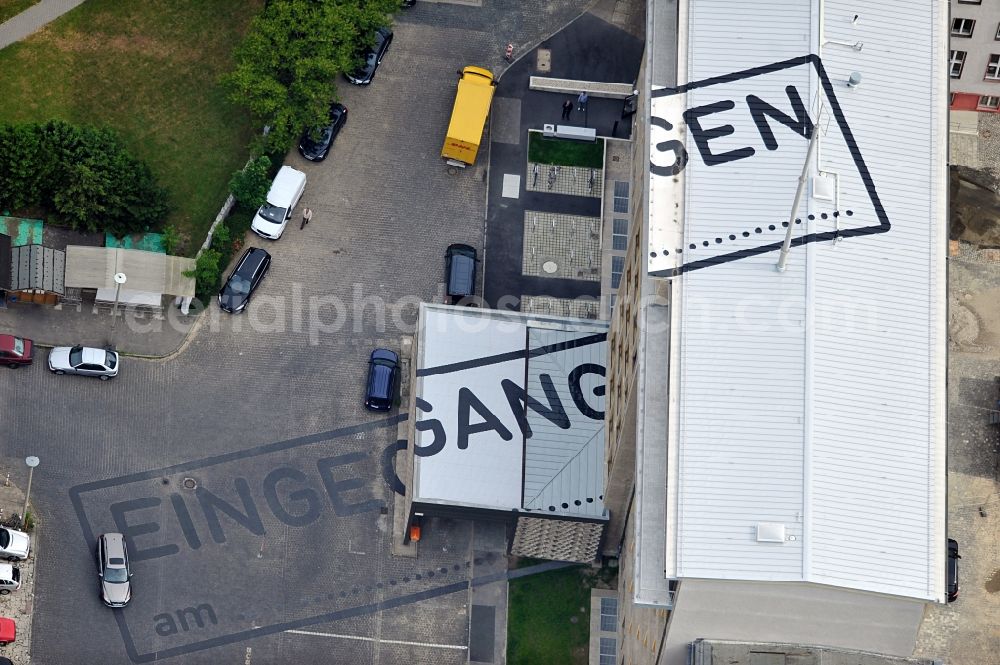 Berlin from above - Top view of an art project on the roof and the forecourt of the Stasi Museum on Rusch St. between Normannen St. and Frankfurter Allee