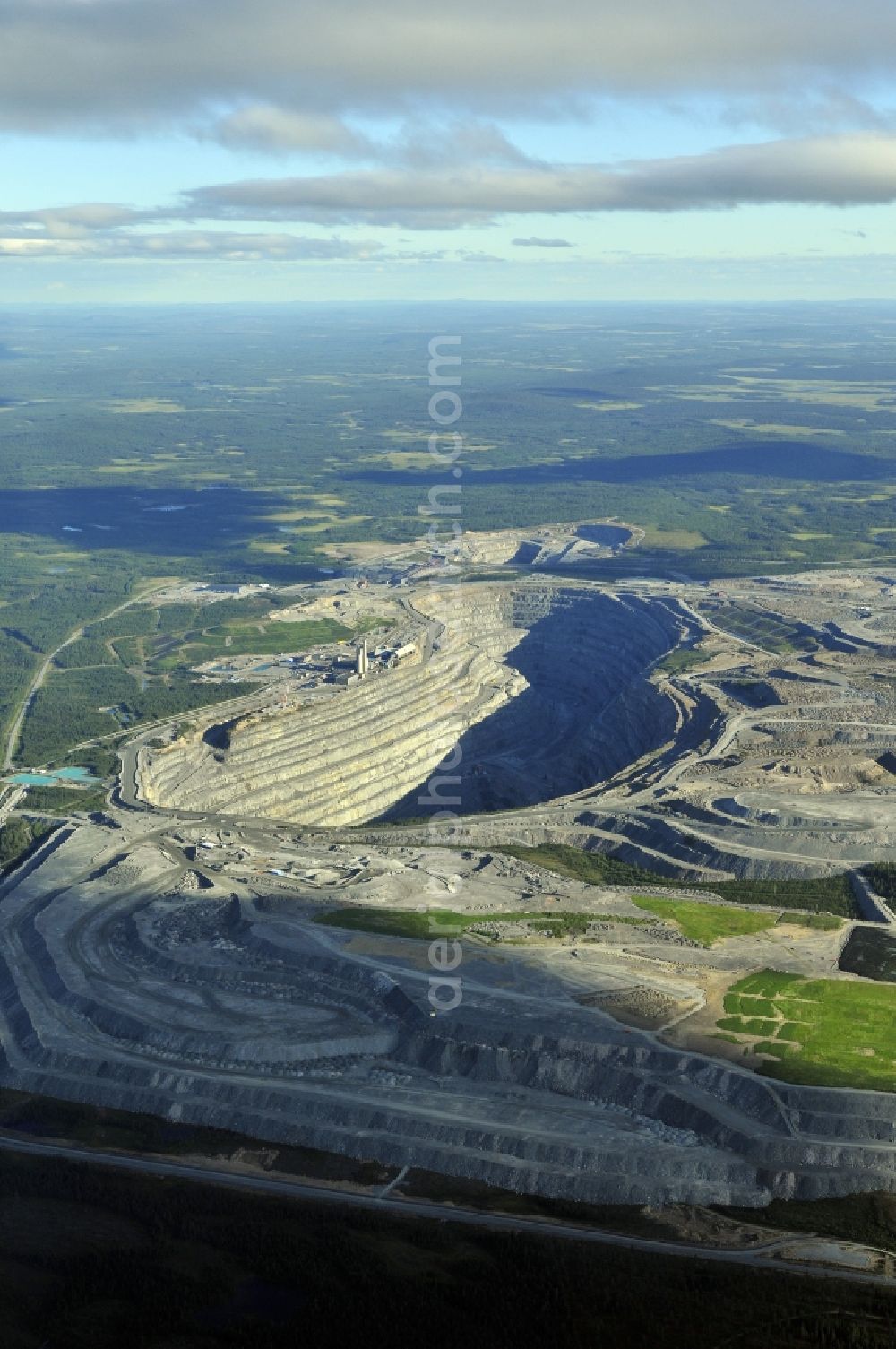 Aerial image Gällivar - Terrain and overburden surfaces of the copper mine open pit in Gaellivar in Sweden