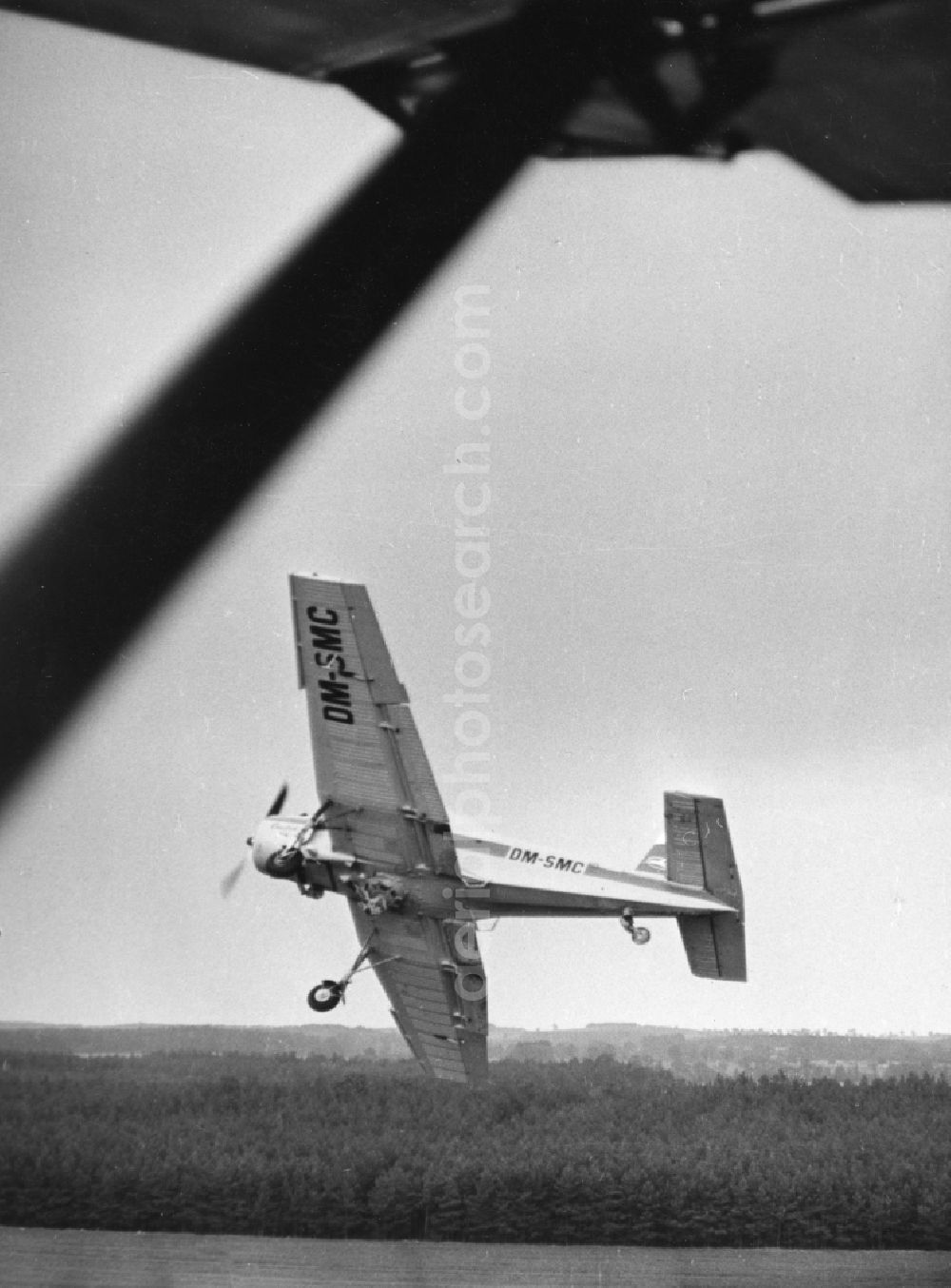 Aerial image Schönefeld - Curve flight of a Z-37 of the INTERFLUG in Schoenefeld in Brandenburg