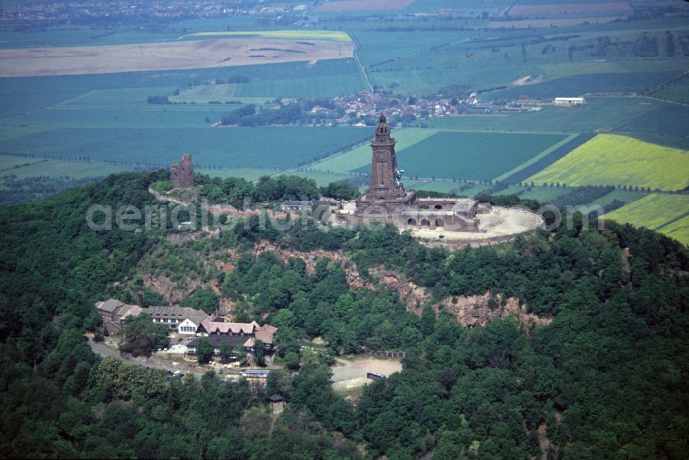 Aerial photograph Bad Frankenhausen - Blick auf das Kyffhäuserdenkmal in Bad Frankenhausen. Das Kyffhäuserdenkmal (auch Barbarossadenkmal oder Kaiser-Wilhelm-Denkmal) auf der Bad Frankenhausen Kuppe des Kyffhäuserberges wurde 1890 bis 1896 zu Ehren von Kaiser Wilhelm I. errichtet. View of the Kyffhäuser monument in Bad Frankenhausen. The Kyffhäuser monument (also Barbarossa Monument or Kaiser-Wilhelm-monument) on the top of the Bad Frankenhausen Kyffhäuser mountain was built from 1890 to 1896 in honor of Kaiser Wilhelm I..