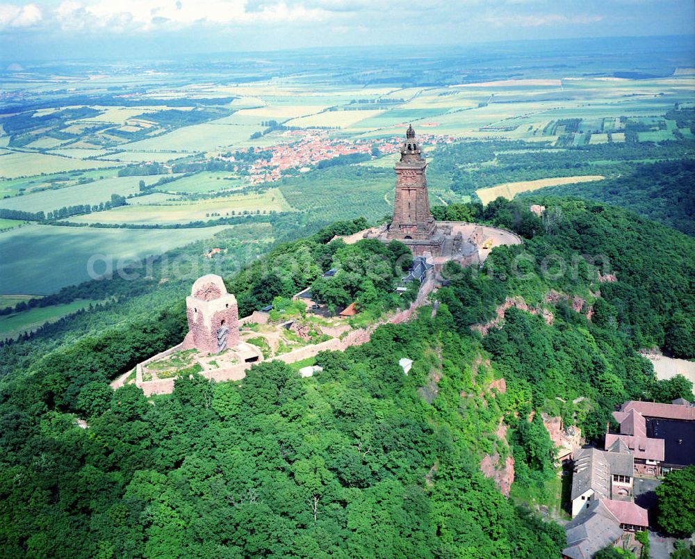 Aerial image Steinthaleben - Blick auf das Kyffhäuserdenkmal in Bad Frankenhausen. Das Kyffhäuserdenkmal (auch Barbarossadenkmal oder Kaiser-Wilhelm-Denkmal) auf der Kuppe des Kyffhäuserberges wurde 1890 bis 1896 zu Ehren von Kaiser Wilhelm I. errichtet. Es ist das drittgrößte Denkmal Deutschlands. View of the Kyffhäuser monument in Bad Frankenhausen. The Kyffhäuser monument (also Barbarossa Monument or Kaiser-Wilhelm-monument) on the top of the Mount Kyffhäuser was built from 1890 to 1896 in honor of Kaiser Wilhelm I.. It is the third largest monument in Germany.