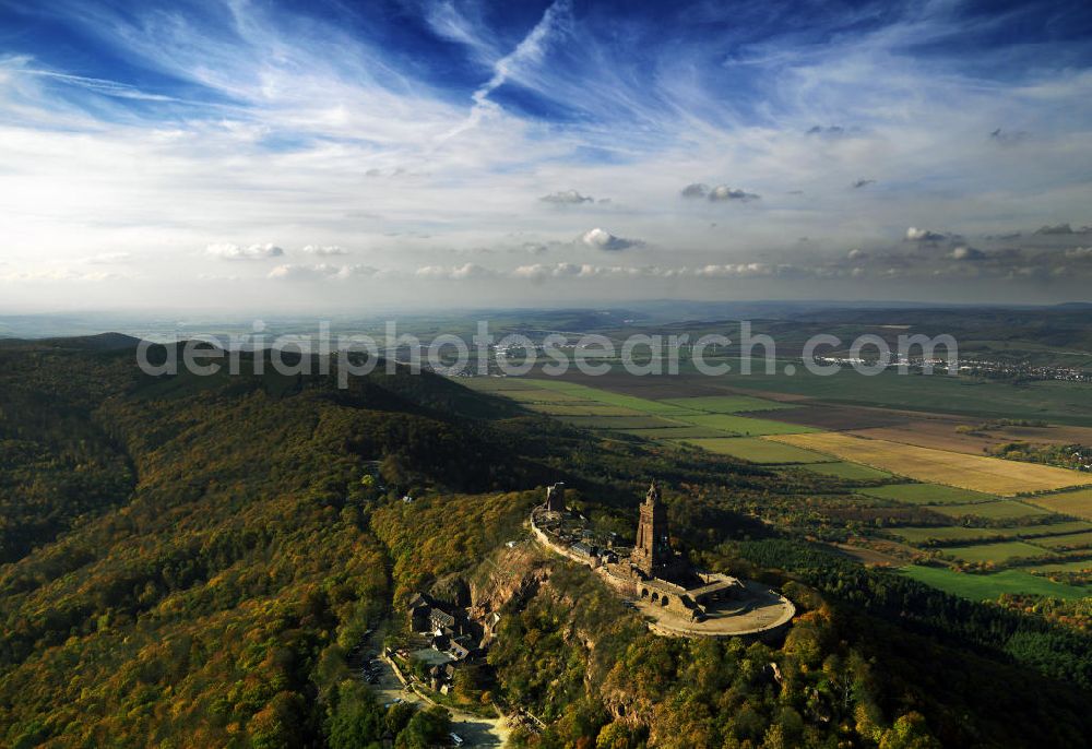 Aerial image Steinthaleben - Blick auf das Kyffhäuserdenkmal in Bad Frankenhausen. Das Kyffhäuserdenkmal (auch Barbarossadenkmal oder Kaiser-Wilhelm-Denkmal) auf der Kuppe des Kyffhäuserberges wurde 1890 bis 1896 zu Ehren von Kaiser Wilhelm I. errichtet. Es ist das drittgrößte Denkmal Deutschlands. View of the Kyffhäuser monument in Bad Frankenhausen. The Kyffhäuser monument (also Barbarossa Monument or Kaiser-Wilhelm-monument) on the top of the Mount Kyffhäuser was built from 1890 to 1896 in honor of Kaiser Wilhelm I.. It is the third largest monument in Germany.