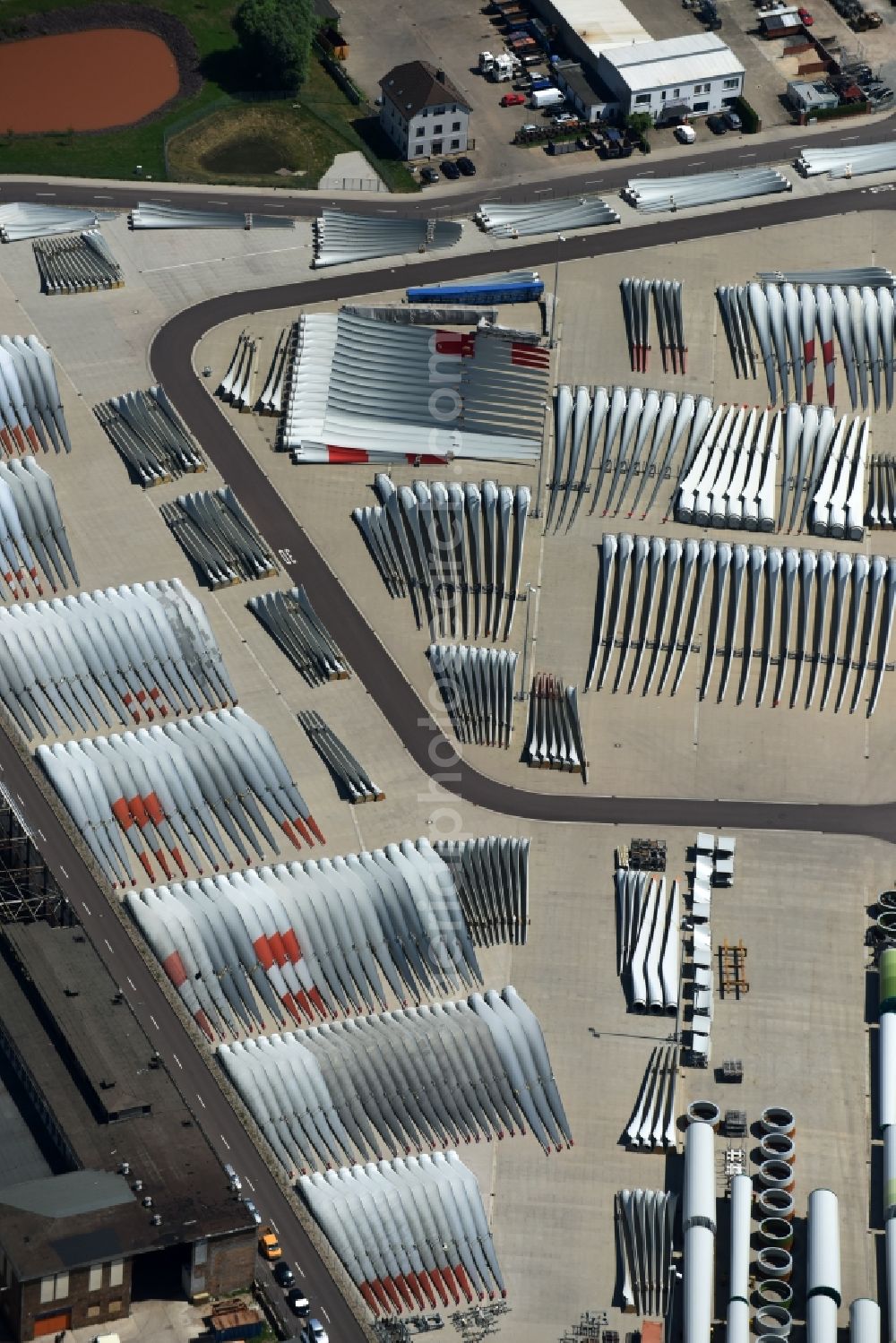 Magdeburg from the bird's eye view: Individual parts of Windmills in Magdeburg on a storage field of the Roswitha & Ingolf Schulz Transport und Tiefbau GmbH in the state Saxony-Anhalt