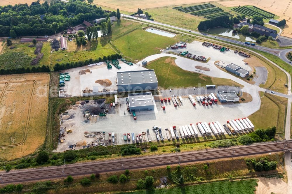 Saint-Amand-Longpre from above - Warehouse complex-building in the industrial area fuer road construction Chavigny Travaux Publics in Saint-Amand-Longpre in Centre-Val de Loire, France