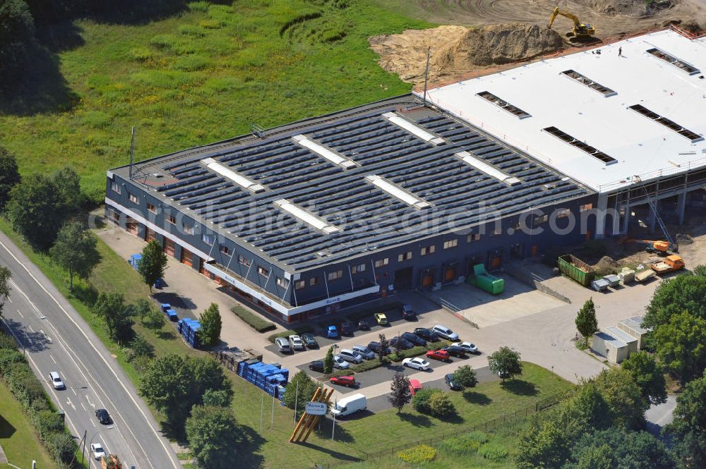 Bergkamen from the bird's eye view: Lager- und Produktionshalle an der Rünther Straße 120 in Bergkamen in Nordrhein-Westfalen / North Rhine-Westphalia. Ein Projekt der Unternehmensgruppe Markus Gerold. Mieter ist die Finnveden Bulten GmbH.