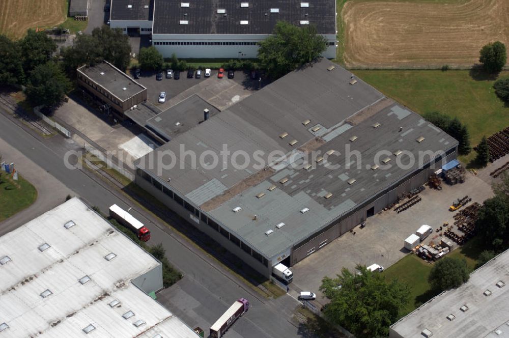 Aerial image Bönen - Lager- und Produktionshalle mit Bürogebäude im Industriegebiet. Der Komplex besteht auf 2 Lager- Produktionshallen mit jeweils ca. 2.500 m² Nutzfläche, Bürotrackt mit ca. 600 m² Nutzfläche, Sozialräume und Garagen. Adresse: Rudolf-Diesel-Str. 10, 59199 Bönen; Vermietung / Verwaltung: Unternehmensgruppe Markus Gerold, An der Vaerstbrücke 1, 59425 Unna, Tel. +49(0)2303 25036-26, Fax +49(0)2303 25036-27, E-Mail: info@markus-gerold.de