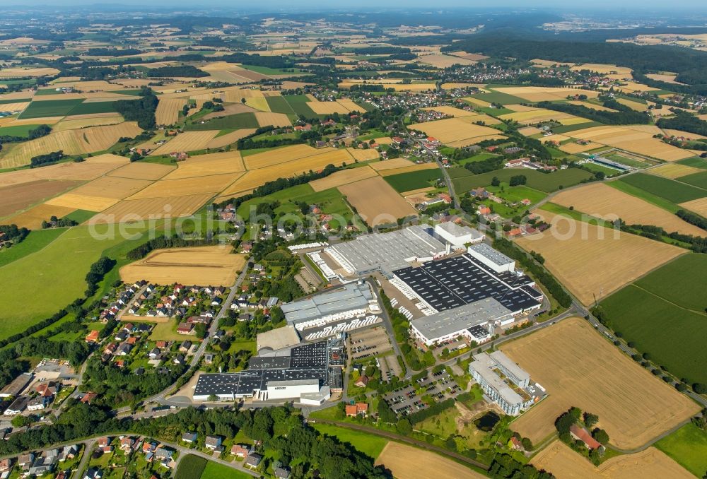 Aerial photograph Rödinghausen - Bearing surface and sales area of Haecker Kuechen GmbH & Co. KG in the industrial area in Roedinghausen in the state North Rhine-Westphalia