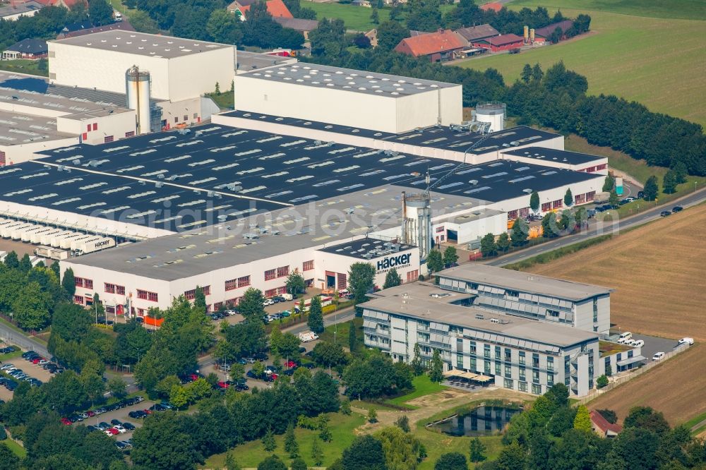 Aerial photograph Rödinghausen - Bearing surface and sales area of Haecker Kuechen GmbH & Co. KG in the industrial area in Roedinghausen in the state North Rhine-Westphalia