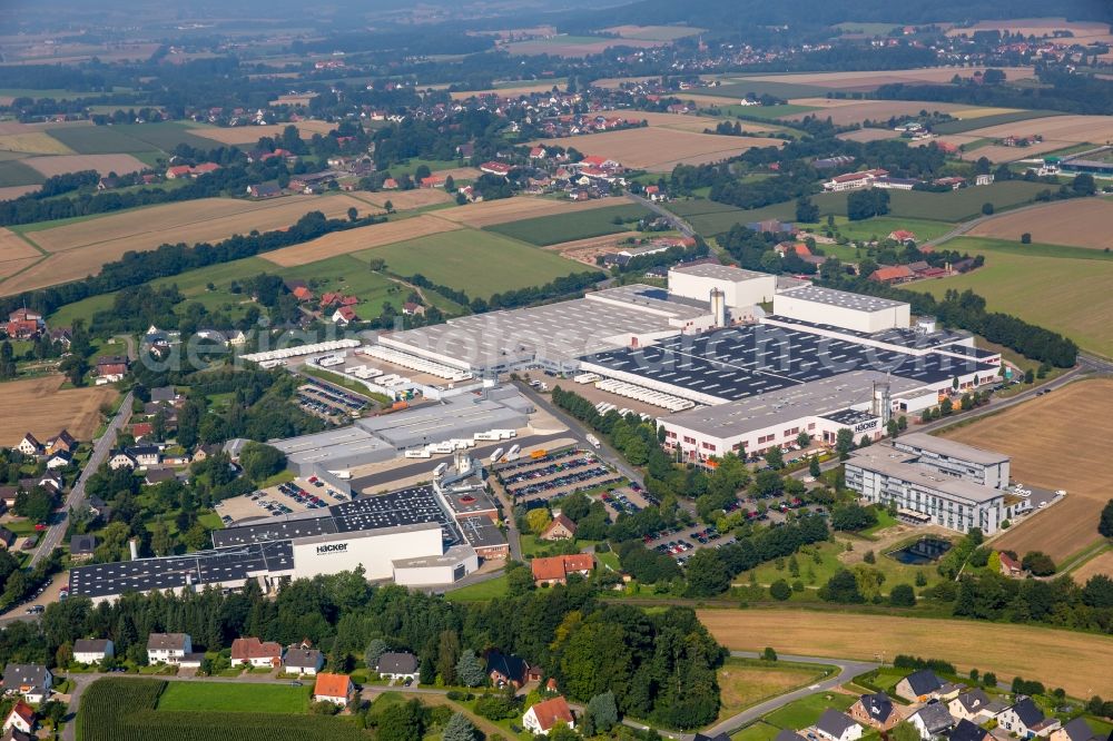 Aerial photograph Rödinghausen - Bearing surface and sales area of Haecker Kuechen GmbH & Co. KG in the industrial area in Roedinghausen in the state North Rhine-Westphalia