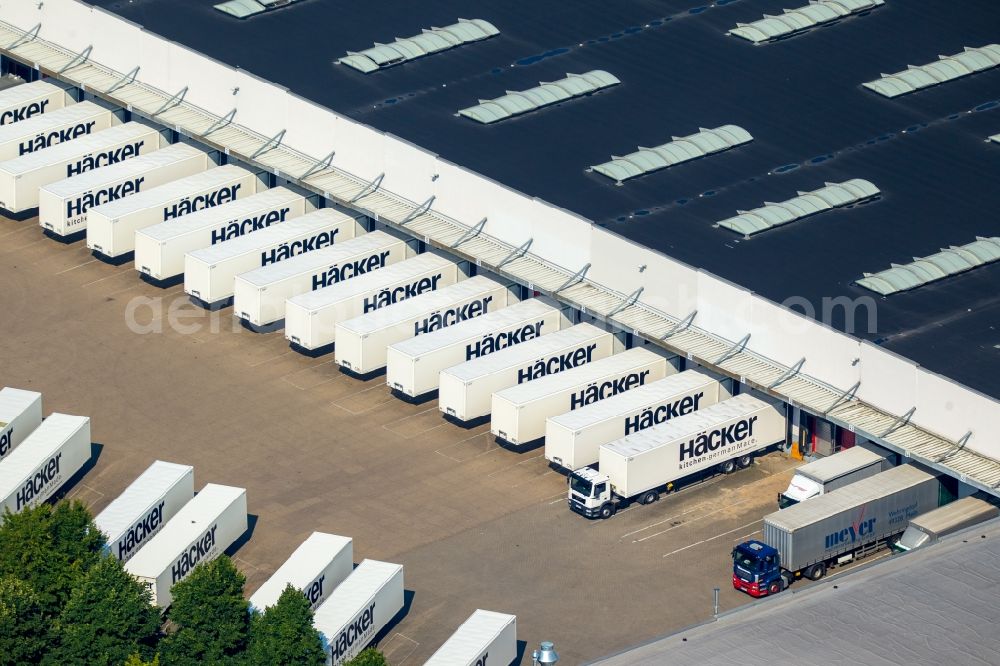 Aerial image Rödinghausen - Bearing surface and sales area of Haecker Kuechen GmbH & Co. KG in the industrial area in Roedinghausen in the state North Rhine-Westphalia