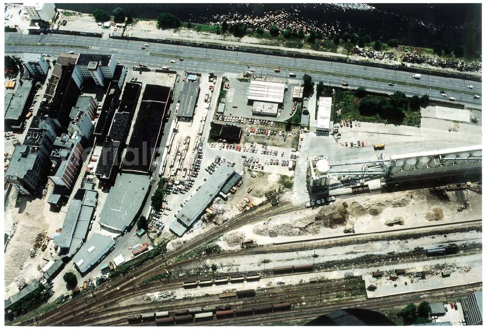 Aerial image Berlin - Friedrichshain - Lagerbereich an der Oberbaumbrücke mit dem Sitz der Firma BEHRENS & PARTNER Servicegesellschaft mbH Geschäftsleitung Herrn Michael Schwarz Mühlenstraße 13 / 14 10243 BERLIN Tel.: 2960726 Fax: 2960943 Funk.: 0172-3244472 oder 3832575