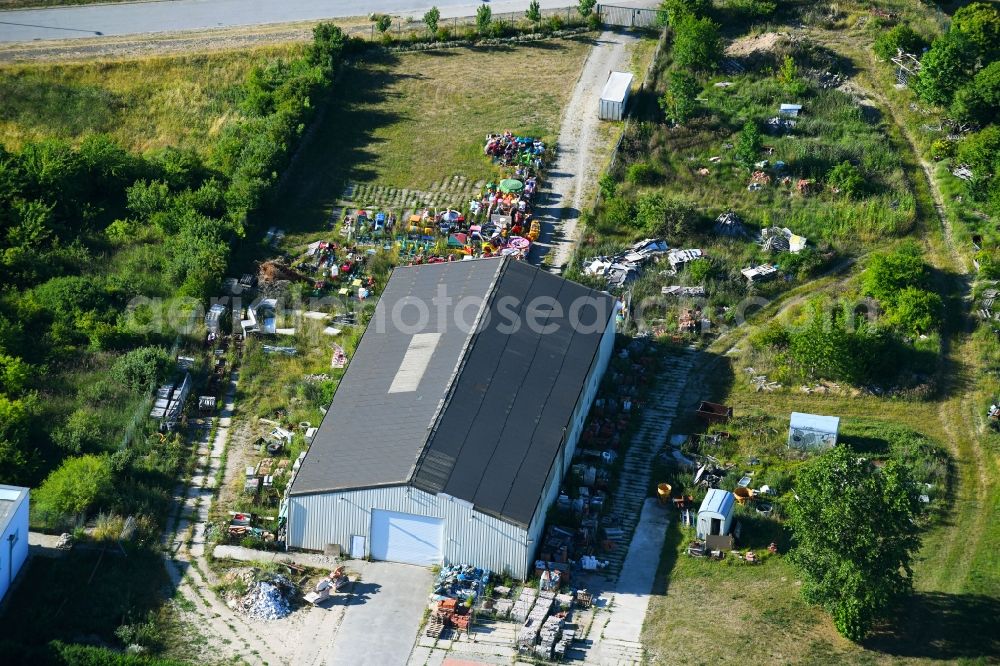 Woldegk from above - Bearing surface fuer discarded toy vending machines and driving machines on Muehlenblick corner Muehlengrandstrasse in the industrial area in Woldegk in the state Mecklenburg - Western Pomerania, Germany