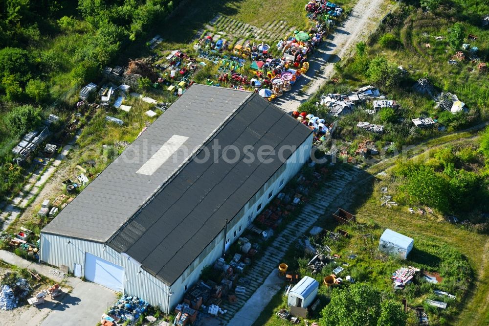 Woldegk from above - Bearing surface fuer discarded toy vending machines and driving machines on Muehlenblick corner Muehlengrandstrasse in the industrial area in Woldegk in the state Mecklenburg - Western Pomerania, Germany