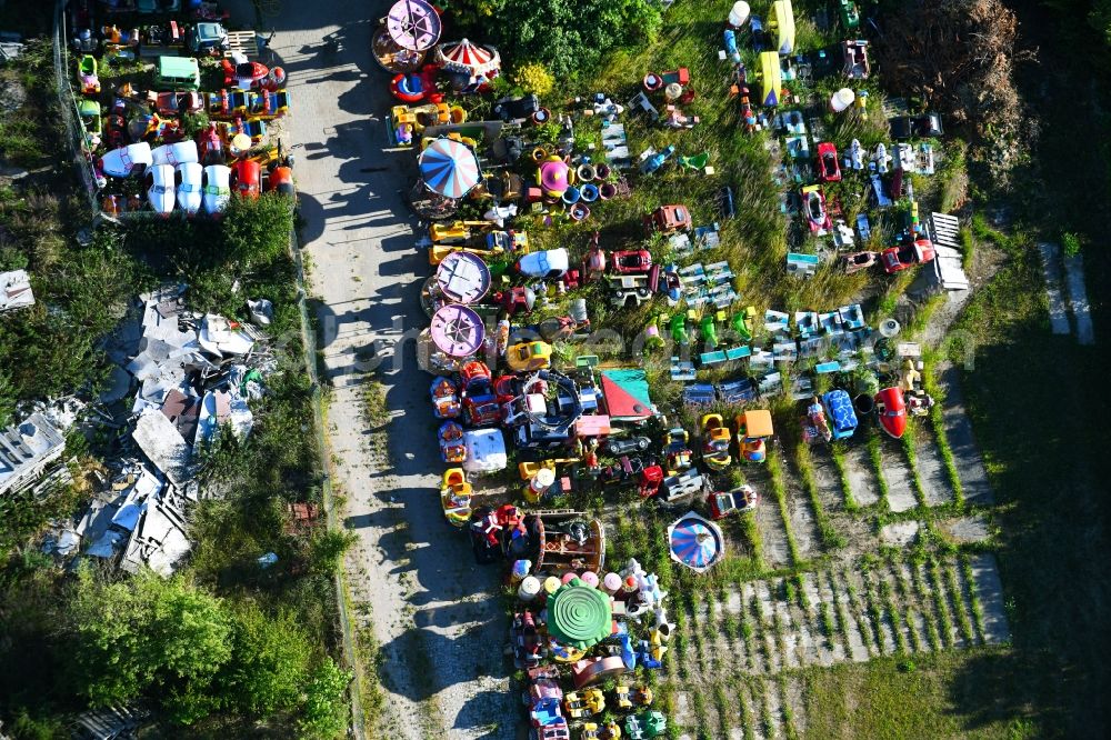 Aerial image Woldegk - Bearing surface fuer discarded toy vending machines and driving machines on Muehlenblick corner Muehlengrandstrasse in the industrial area in Woldegk in the state Mecklenburg - Western Pomerania, Germany