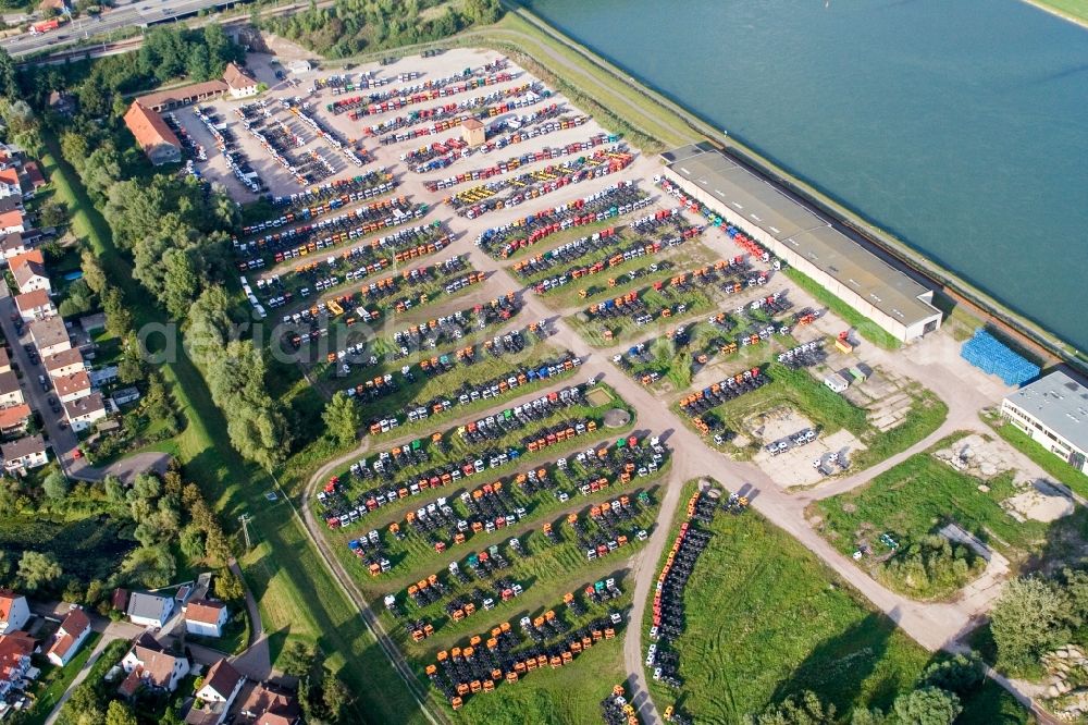 Aerial photograph Wörth am Rhein - Bearing surface for Daimler-Trucks in the industrial area in the district Maximiliansau in Woerth am Rhein in the state Rhineland-Palatinate, Germany