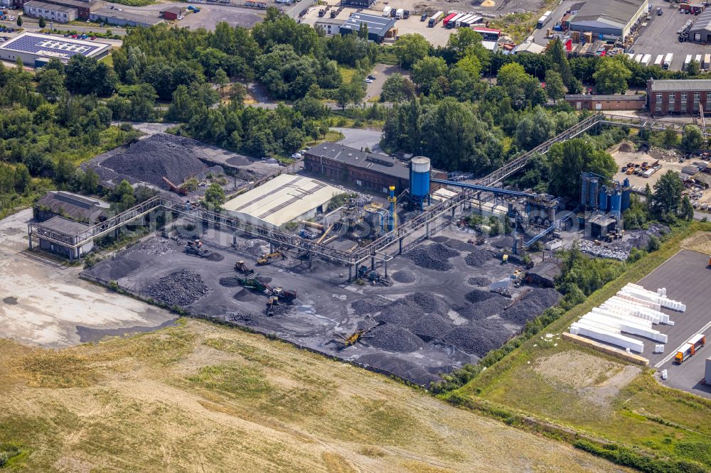 Castrop-Rauxel from the bird's eye view: Bearing surface fuer Kohle in the industrial area on street Wartburg-Stiftung Eisenachstrasse in Castrop-Rauxel at Ruhrgebiet in the state North Rhine-Westphalia, Germany