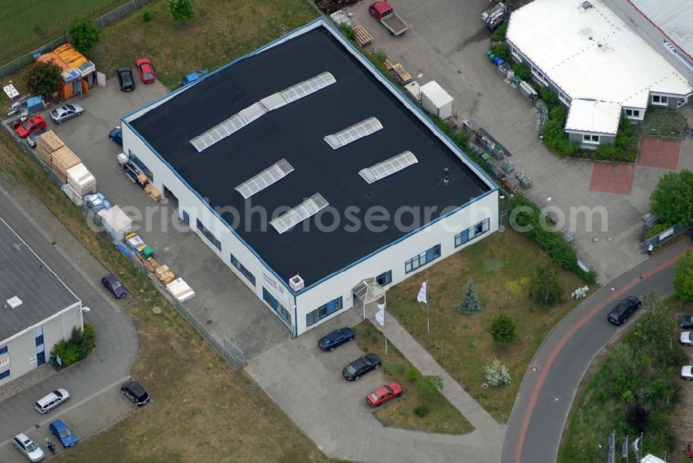 Aerial image Groß-Machnow - Lagerhalle von Fräntzel Kunststoffe GmbH; Gewerbegebiet Theresenhof; Am Spitzberg1; 15806 Groß-Machnow;Tel: 033708 - 42 3 0; Fax: 033708 - 42 3 33; e-mail: webmaster@fraentzel-kunststoffe.de