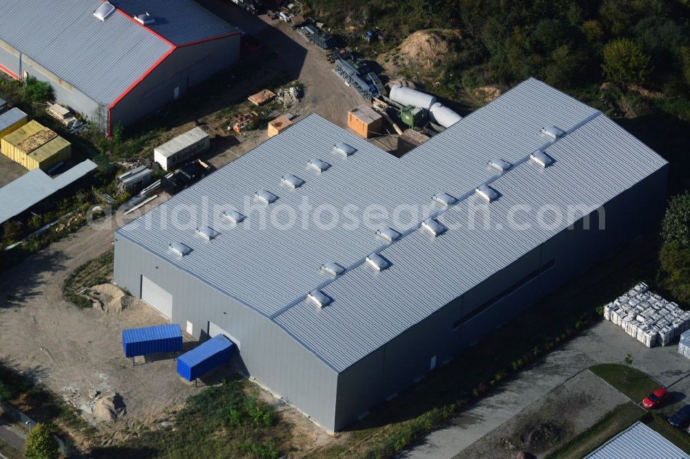 Strausberg from the bird's eye view: Newly built warehouse in the industrial area on the street Am Biotop in Strausberg in Brandenburg