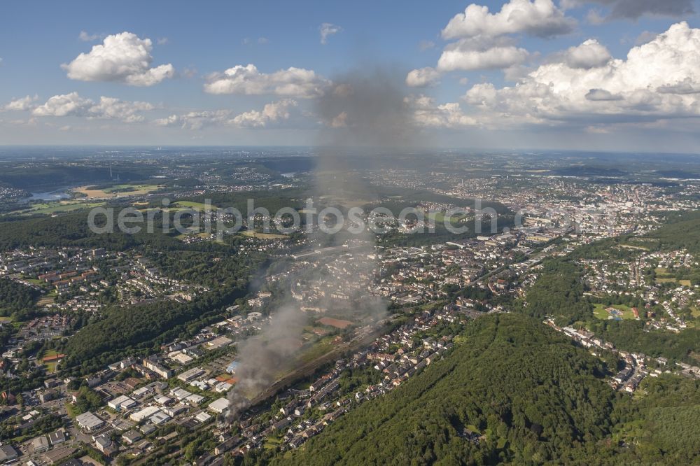 Aerial image Hagen - The fire extinguishing work on a destroyed by the fire warehouse in Hagen in North Rhine-Westphalia