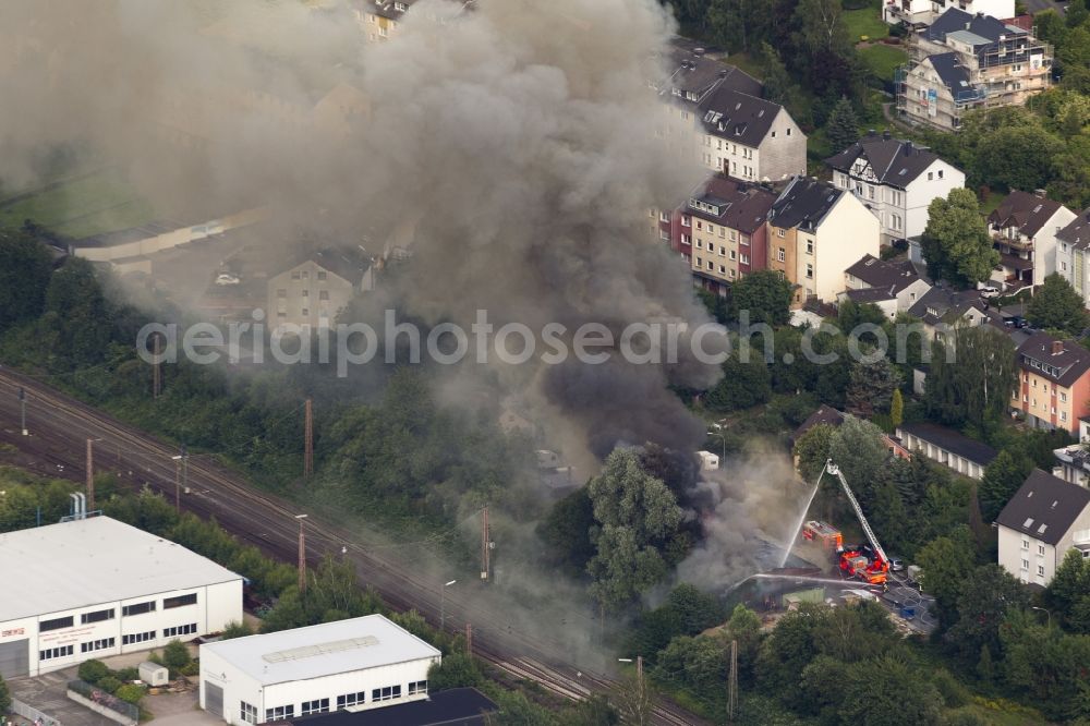 Aerial photograph Hagen - The fire extinguishing work on a destroyed by the fire warehouse in Hagen in North Rhine-Westphalia