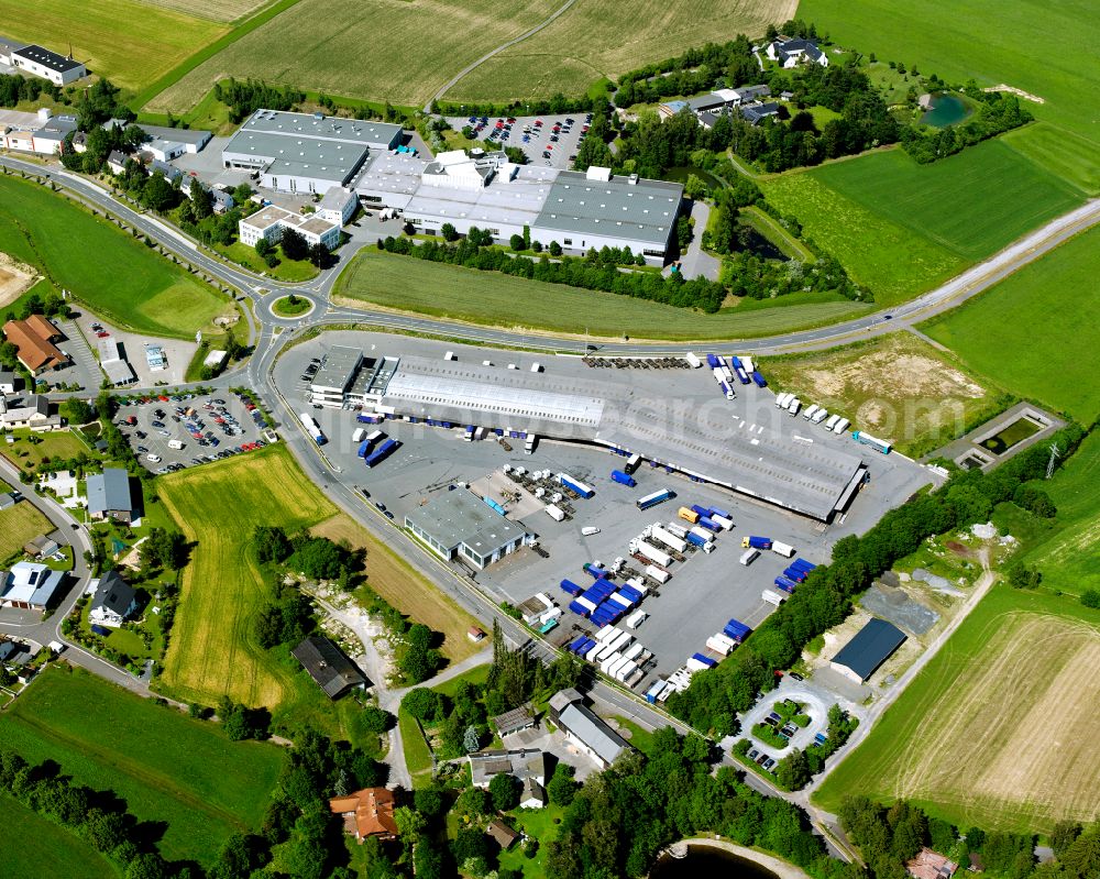 Aerial image Konradsreuth - Warehouses and forwarding building amm logistics GmbH on street Silberbacher Strasse in the district Steinmuehle in Konradsreuth in the state Bavaria, Germany