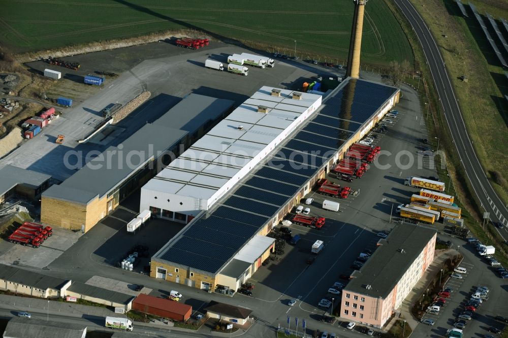 Aerial photograph Taucha - Warehouses and forwarding building Gilles & Wagner Spedition GmbH & Co. KG on Poenitzer Weg in Taucha in the state Saxony