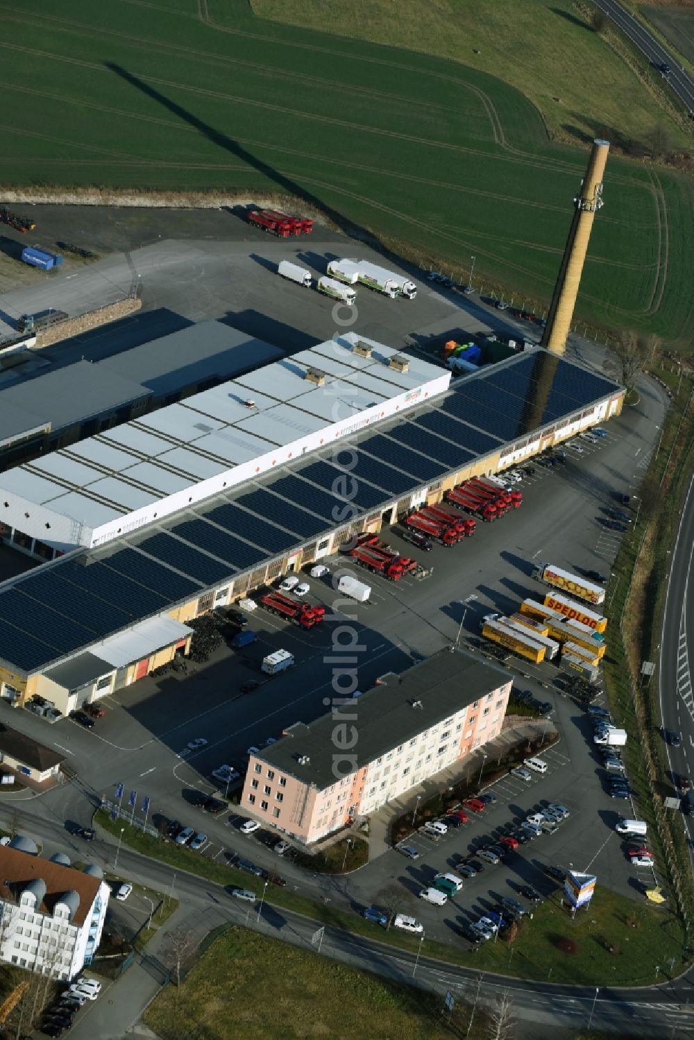 Aerial image Taucha - Warehouses and forwarding building Gilles & Wagner Spedition GmbH & Co. KG on Poenitzer Weg in Taucha in the state Saxony