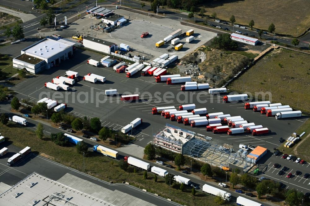 Aerial photograph Grünheide (Mark) - Warehouses and forwarding building of Ludwig Meyer GmbH & Co. KG overlooking a construction site on Birkenstrasse in the district Freienbrink in Gruenheide (Mark) in the state Brandenburg, Germany