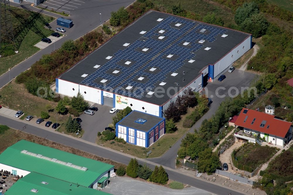 Grünsfeld from the bird's eye view: Warehouses and forwarding building of NATURATA Logistik eG on Waltersberg in Gruensfeld in the state Baden-Wurttemberg, Germany