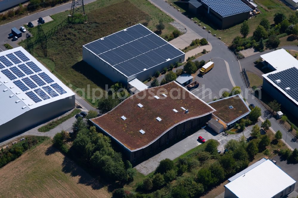 Grünsfeld from the bird's eye view: Warehouses and forwarding building of NATURATA Logistik eG at Waltersberg in Gruensfeld in the state Baden-Wurttemberg, Germany