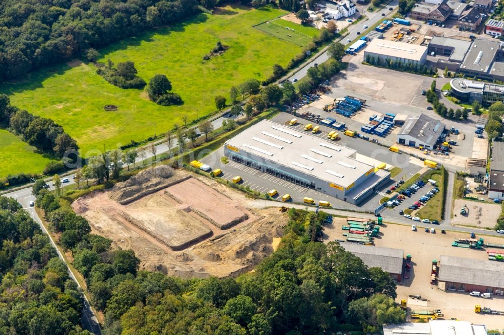 Aerial photograph Dinslaken - Construction site for a warehouse and forwarding building with office and production areas of the construction company WALTER HELLMICH GmbH at Lanterstrasse in Dinslaken in the state North Rhine-Westphalia, Germany