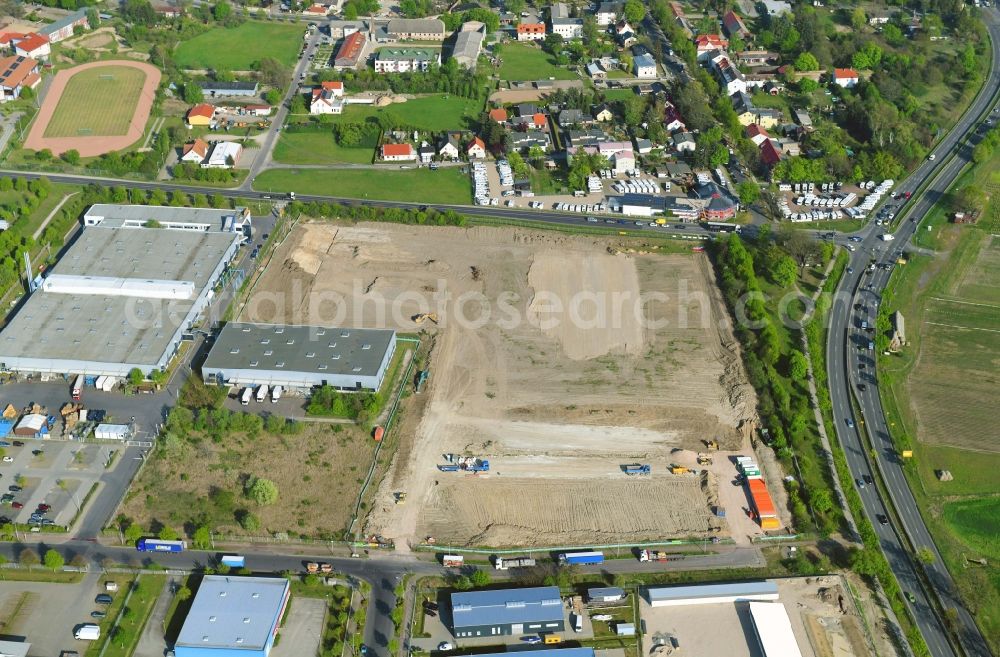 Hoppegarten from the bird's eye view: Construction site for a warehouse and forwarding building Digitalstrasse- Neuer Hoenower Weg on federal street B1 in the district Dahlwitz-Hoppegarten in Hoppegarten in the state Brandenburg, Germany