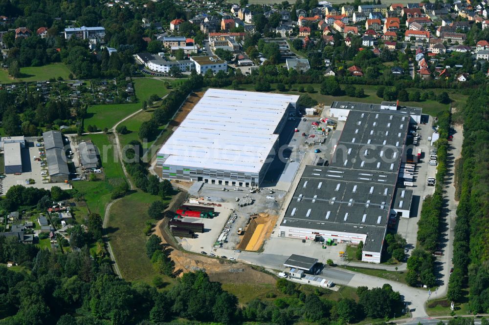 Aerial photograph Radeberg - Construction site for a warehouse and forwarding building on the former Coca-Cola-Gelaende in Radeberg in the state Saxony, Germany