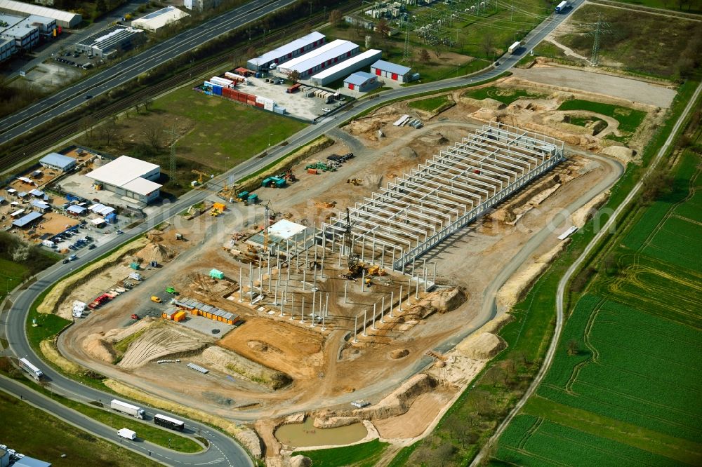 Mainaschaff from the bird's eye view: Construction site for a warehouse and forwarding building Im Hofgewann in Mainaschaff in the state Bavaria, Germany