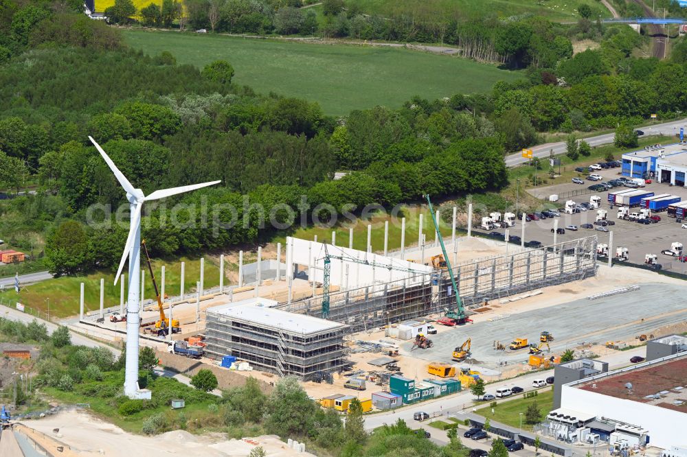 Lübeck from the bird's eye view: Construction site for a warehouse and forwarding building of Spedition Bruhn on street Henry-Koch-Strasse in Luebeck-Travemuende on street Henry-Koch-Strasse in Luebeck in the state Schleswig-Holstein, Germany