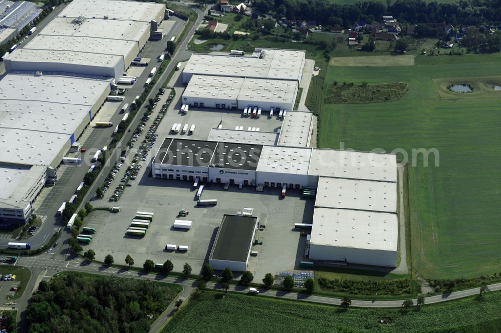 Meineweh from the bird's eye view: Warehouses and forwarding building of Offergeld Logistik GmbH & Co. oHG on Pretzscher Weg in the district Schleinitz in Meineweh in the state Saxony-Anhalt, Germany