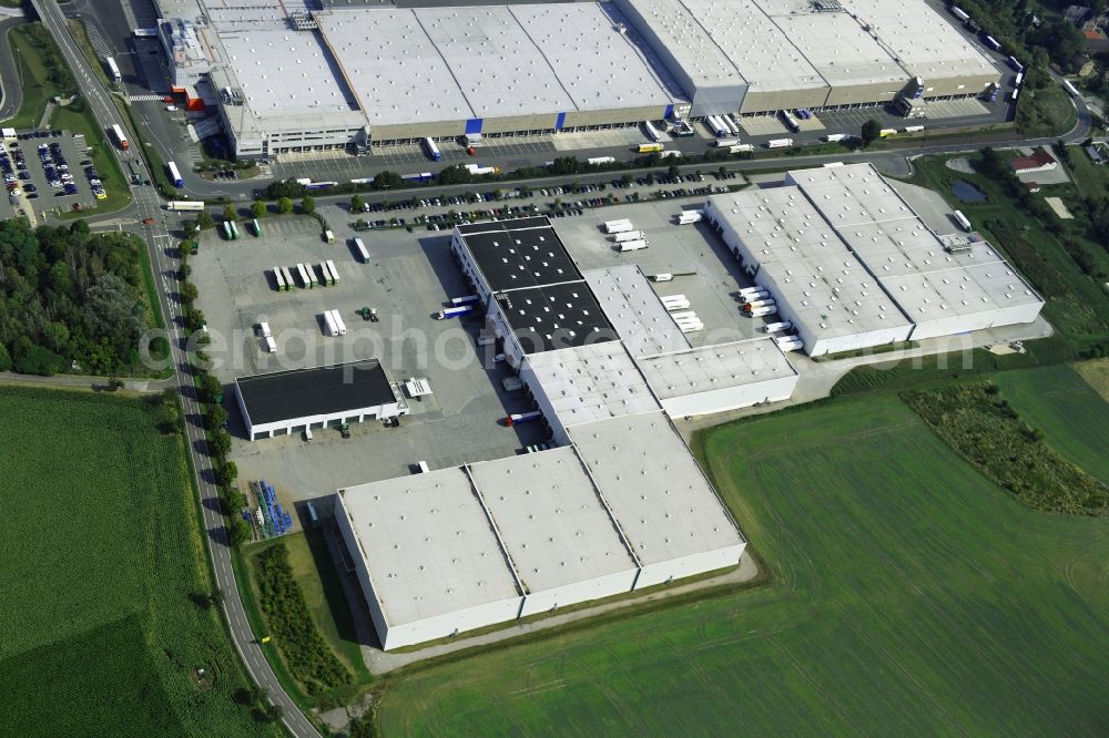 Meineweh from the bird's eye view: Warehouses and forwarding building of Offergeld Logistik GmbH & Co. oHG on Pretzscher Weg in the district Schleinitz in Meineweh in the state Saxony-Anhalt, Germany